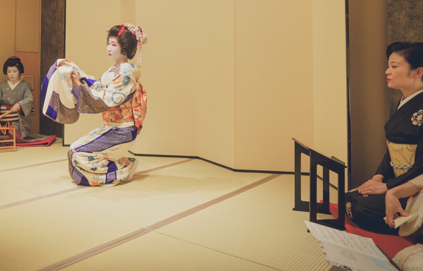 Asakusa geisha performing traditional dance at a private ozashiki banquet in Tokyo