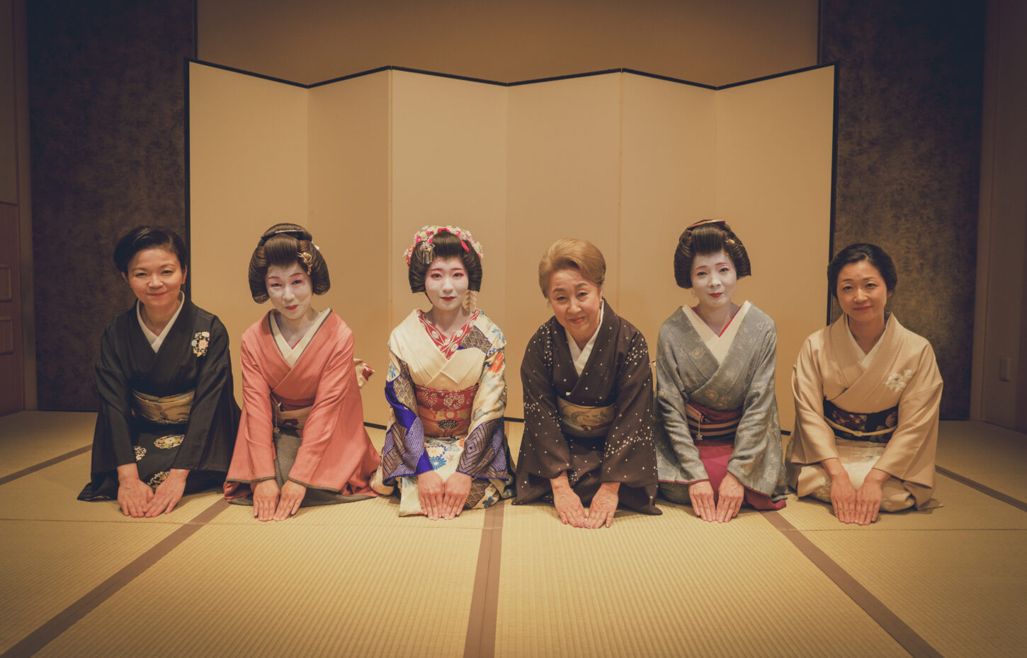 Geisha in kimono at a traditional ozashiki in Japan