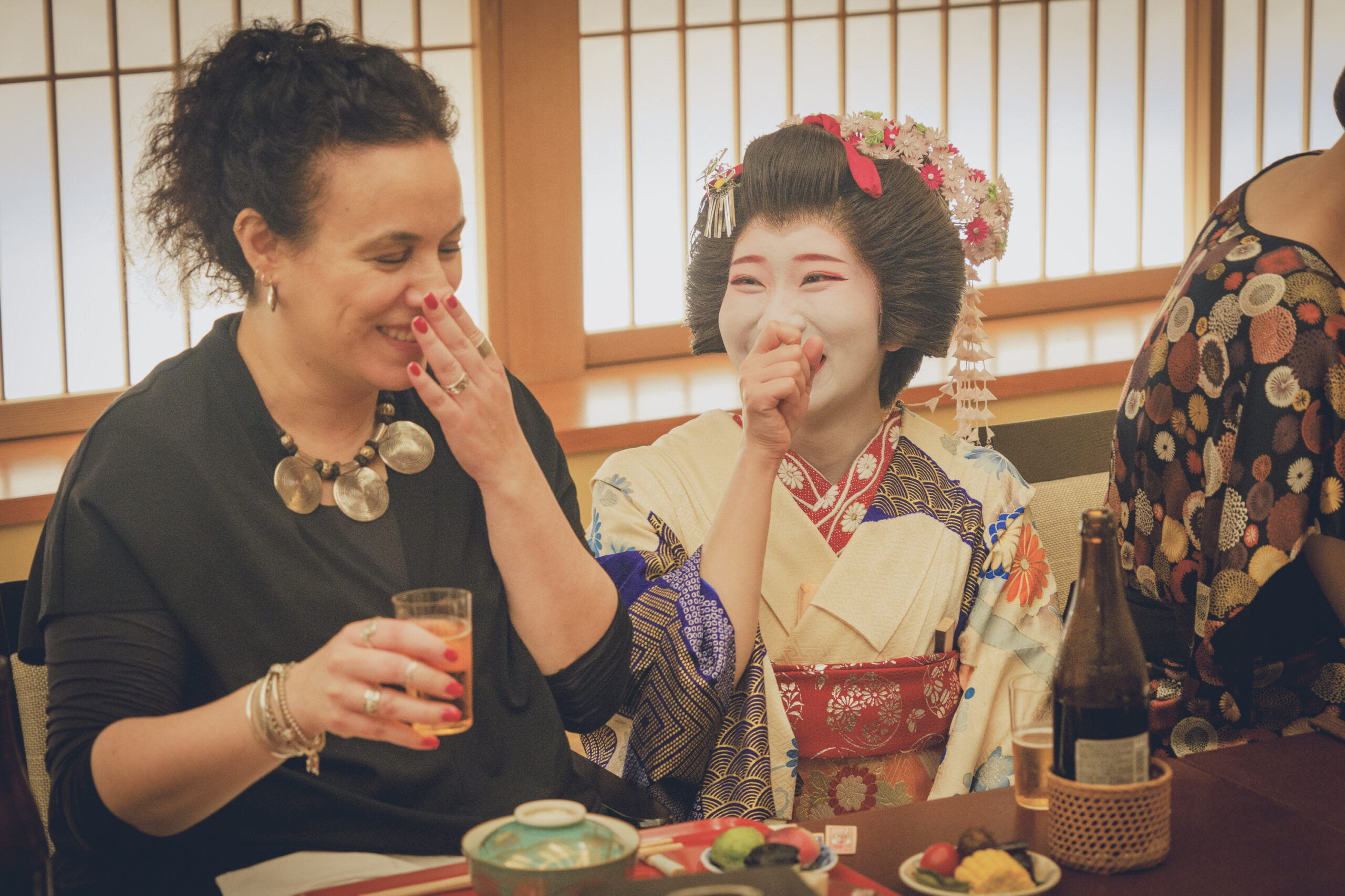 Geisha performing at an ozashiki banquet inside Asakusa Miyakodori, the historic chaya in Tokyo