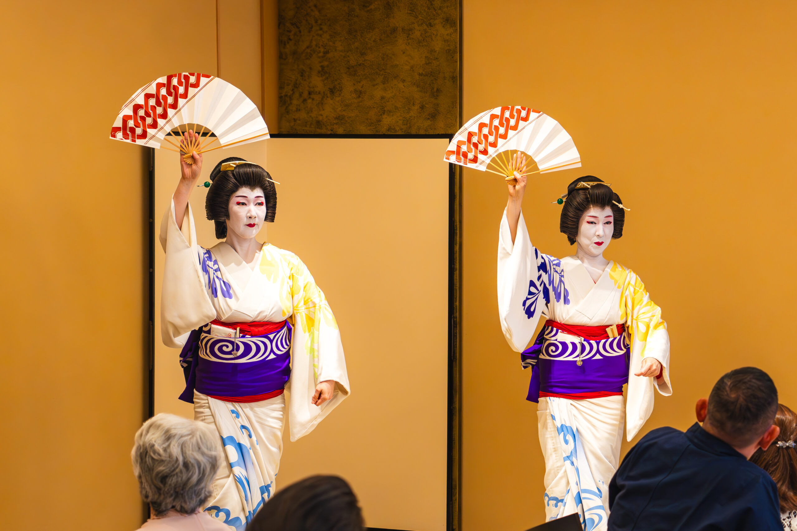 Geisha performing at a public festival in Asakusa — traditional dance on a grand scale