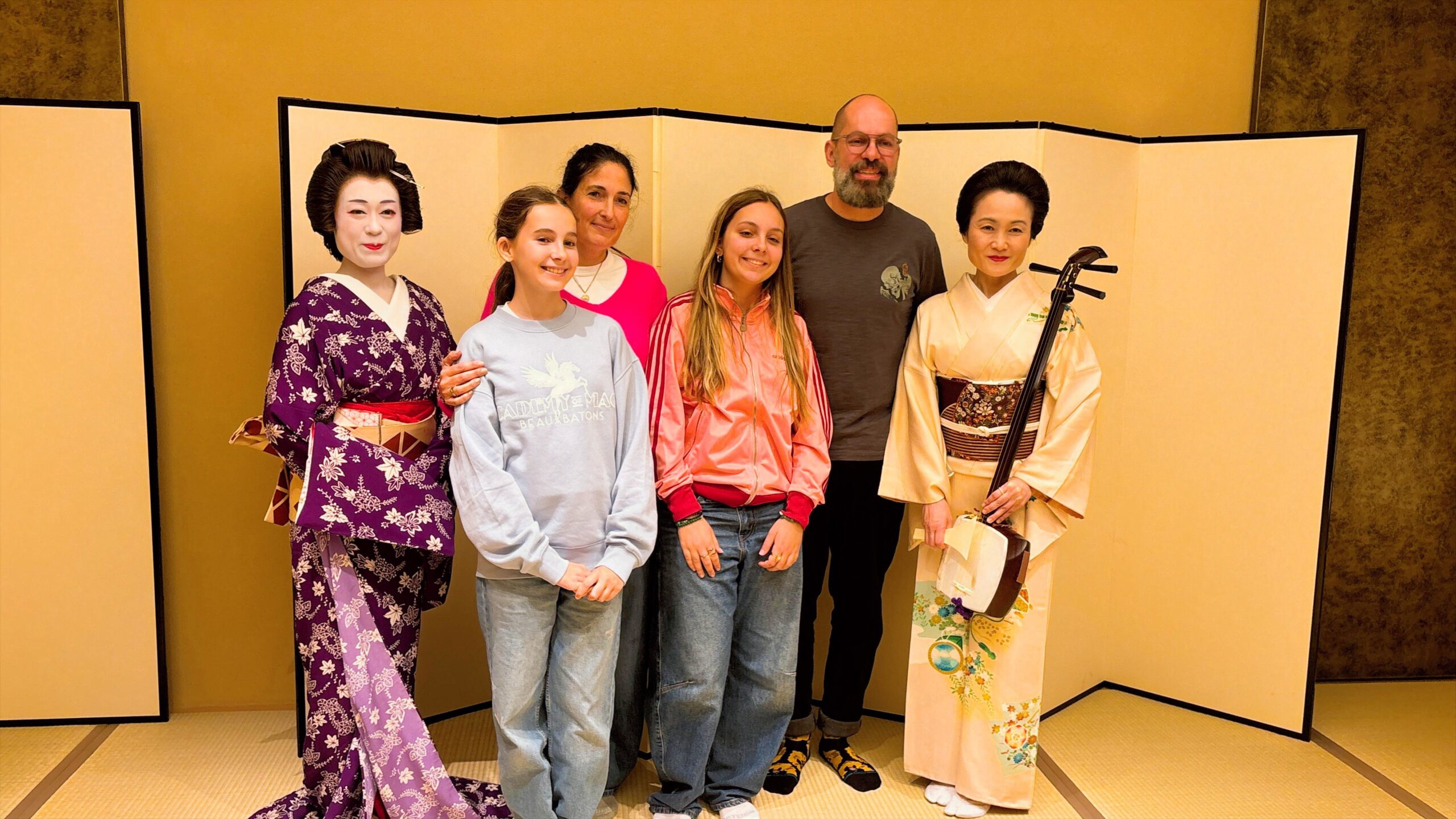A group photo with the geisha