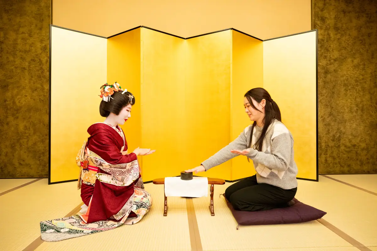 Konpira Fune Fune in play at Miyakodori — a parlor game that requires a singing geisha and live shamisen, marking the venue as authentic
