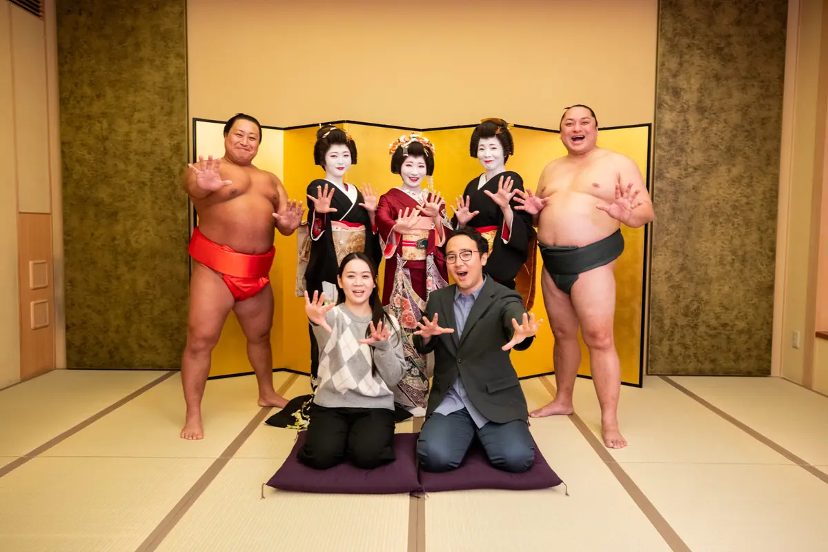 Guest photo with sumo performer at Miyakodori ozashiki experience