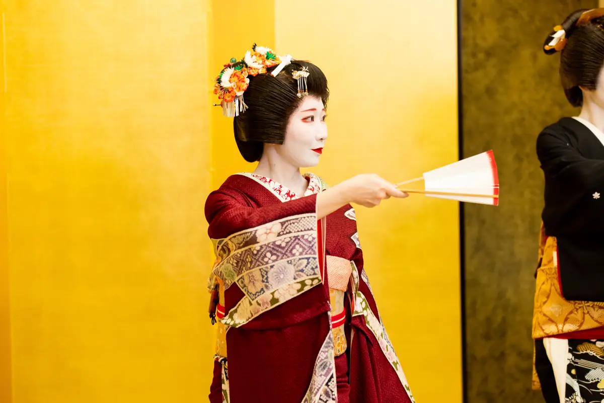 Geisha performing traditional dance at Miyakodori ozashiki in Asakusa
