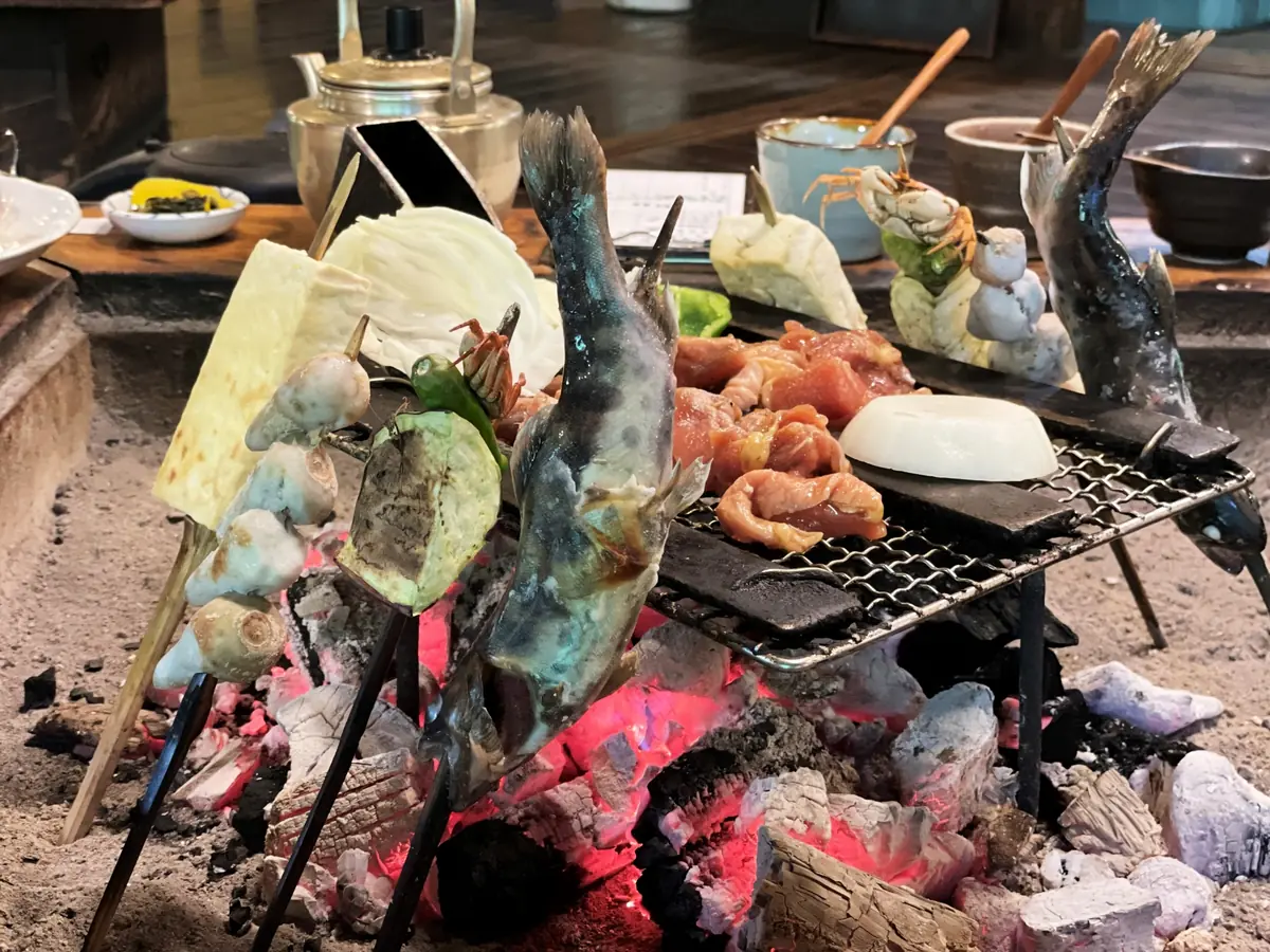 Lively group birthday dinner at a traditional Japanese izakaya-style restaurant in Tokyo
