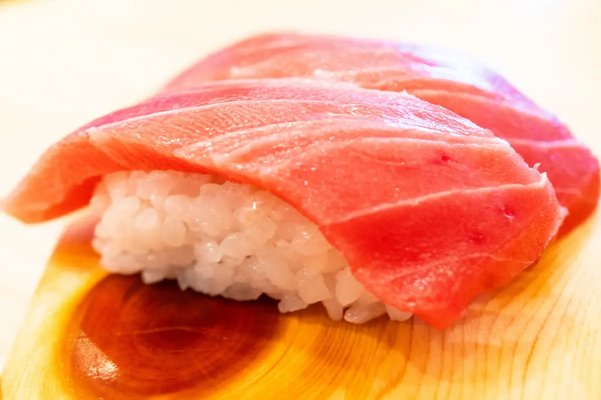 Fresh sushi on plates at a conveyor belt sushi restaurant in Asakusa