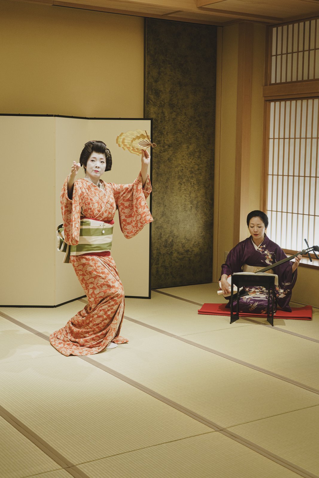 Asakusa geisha performing a dance to live shamisen in a private tatami room at Miyakodori