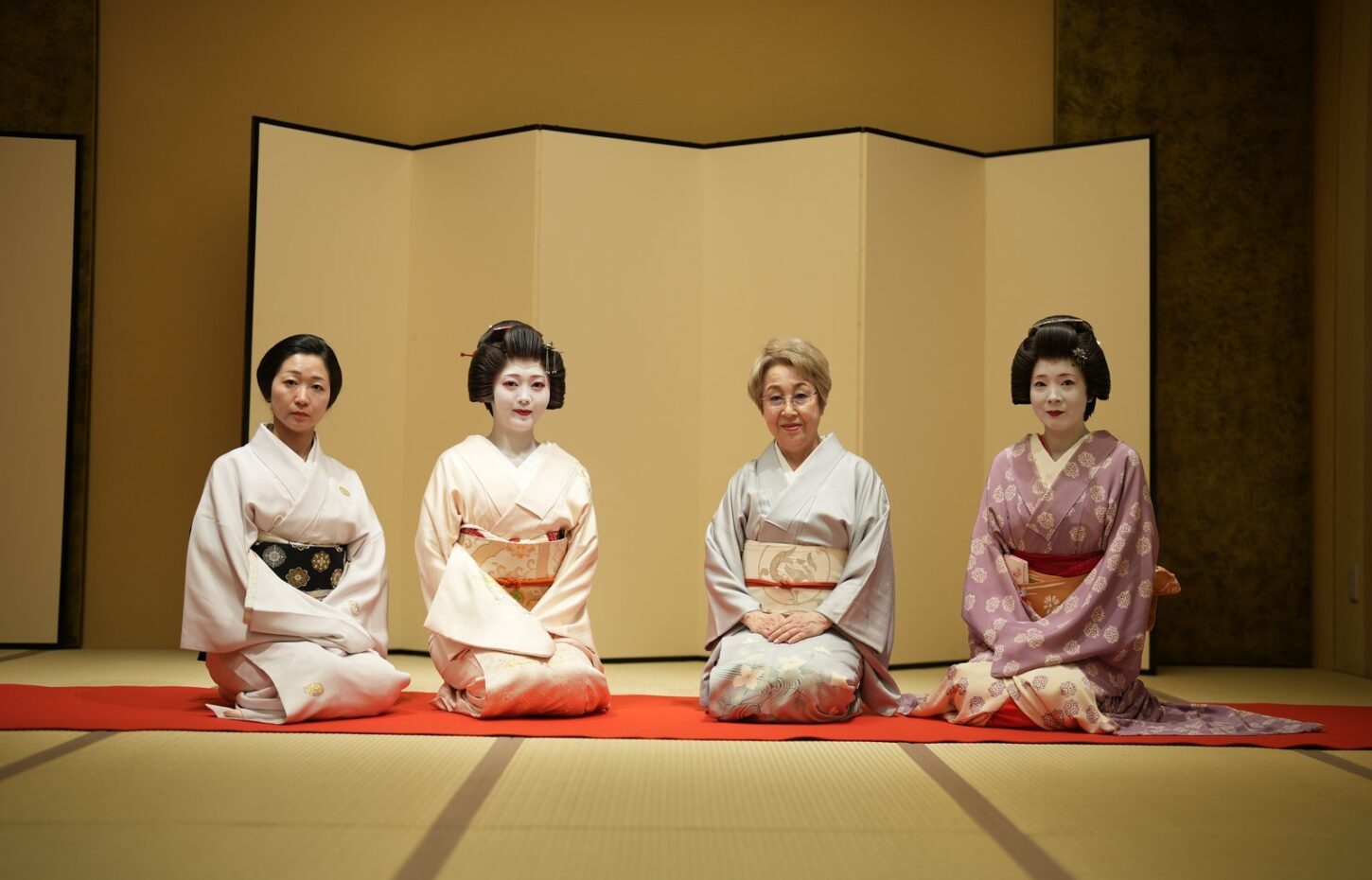 Geisha in formal kimono with the okami in a tatami room at Miyakodori, the only machiai-chaya in Asakusa