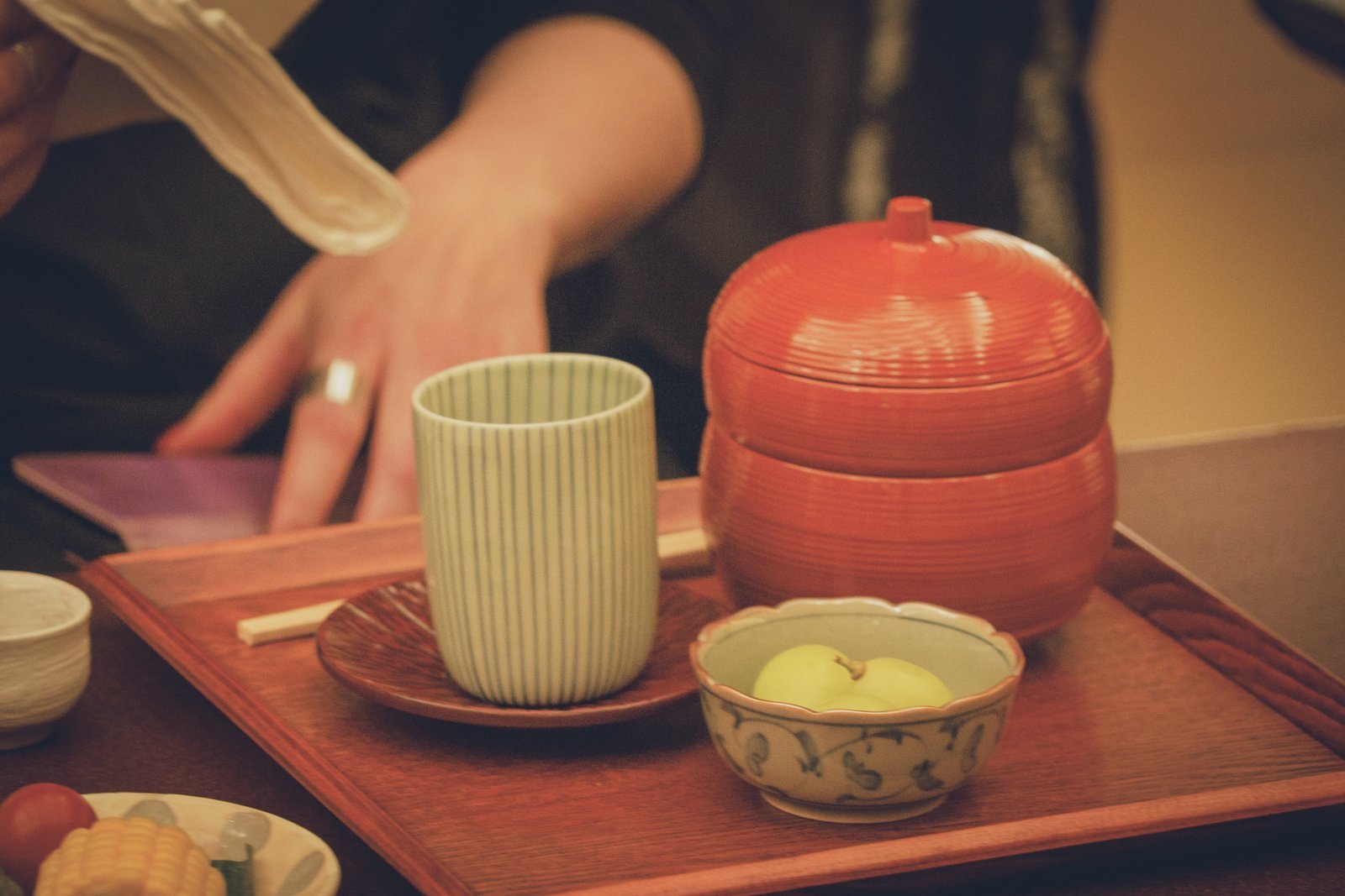 A seasonal kaiseki course laid out on the low table before the geisha arrive