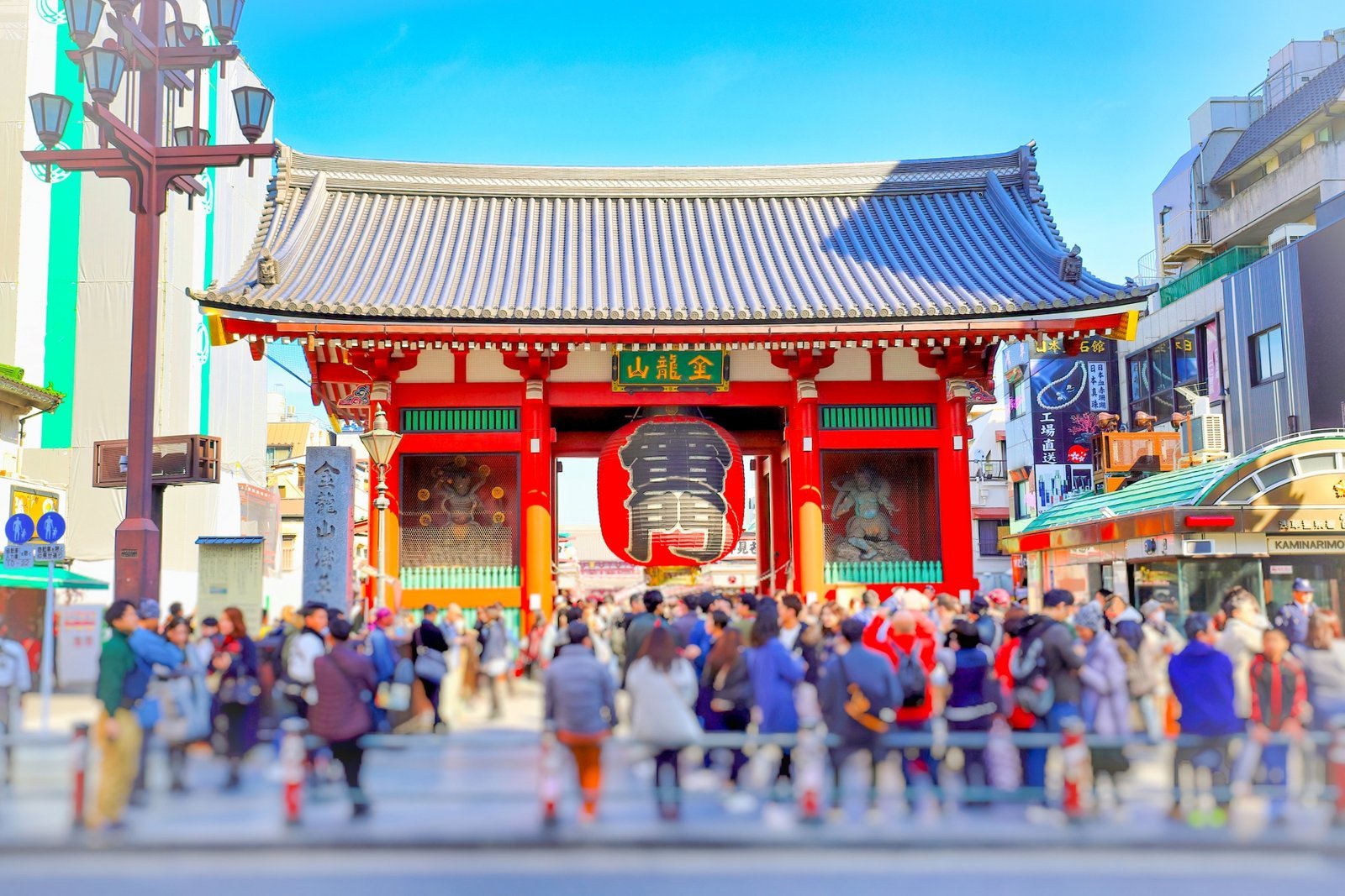 The wide Kaminarimon-dori avenue near Kaminarimon gate during Sanja Matsuri, where spectators have space to watch the mikoshi pass