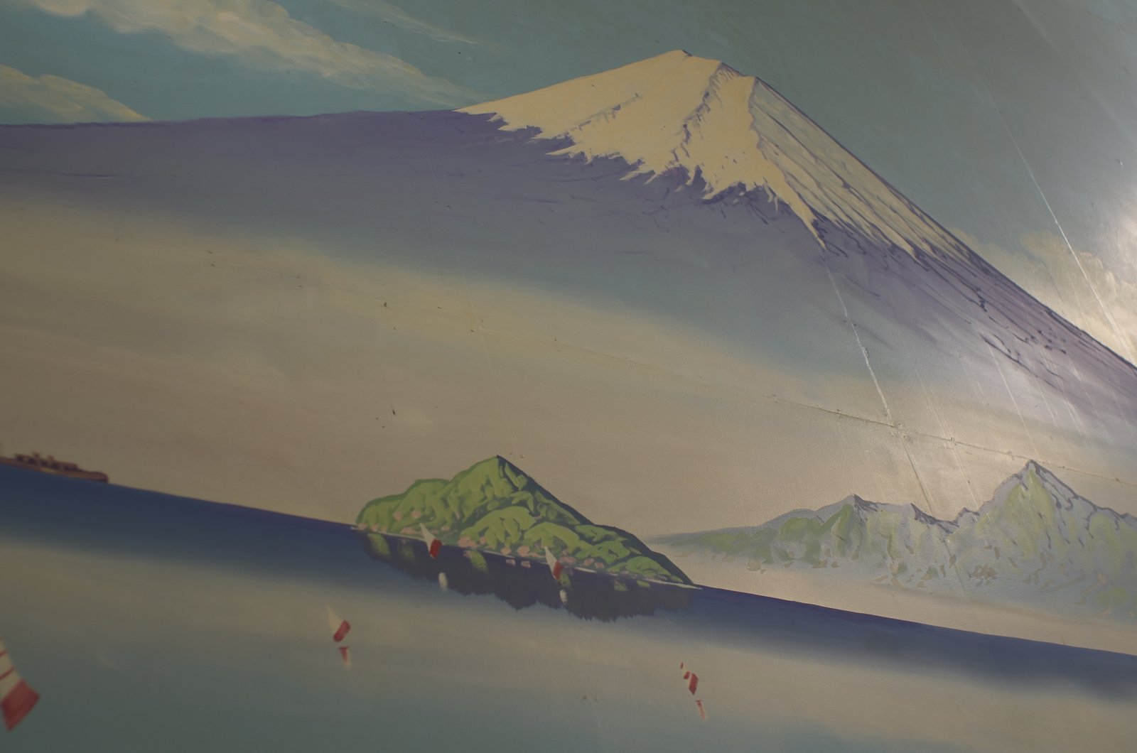 A painting of Mount Fuji on the wall of a Japanese sento