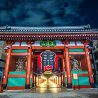 Kaminarimon Gate in Asakusa lit up at night, with Nakamise-dori beyond
