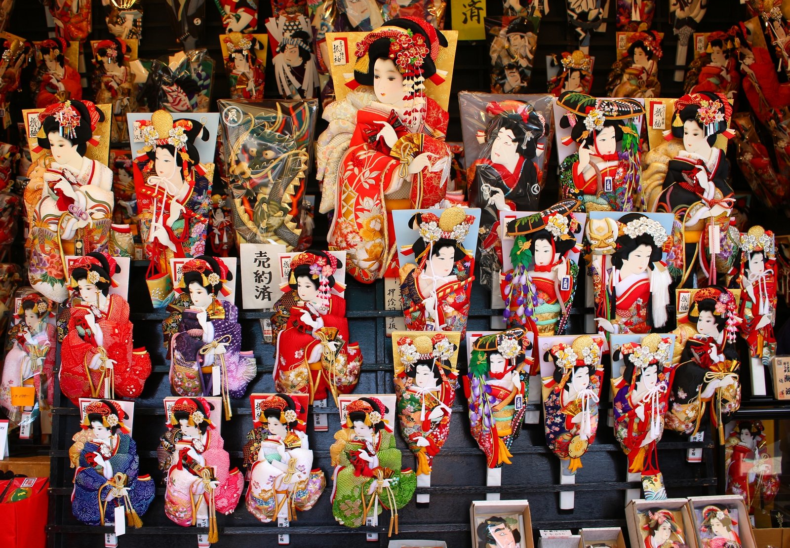 Decorated hagoita paddles on display at a stall at the Hagoita Market in Senso-ji