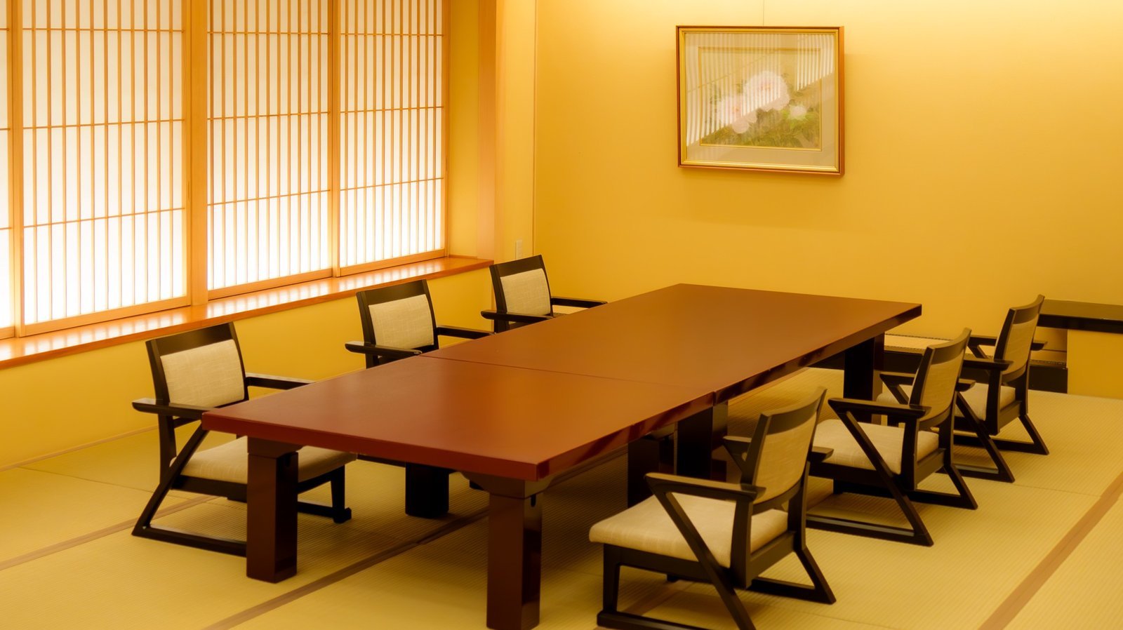 A tatami banquet room at Miyakodori with a lacquered table and low chairs